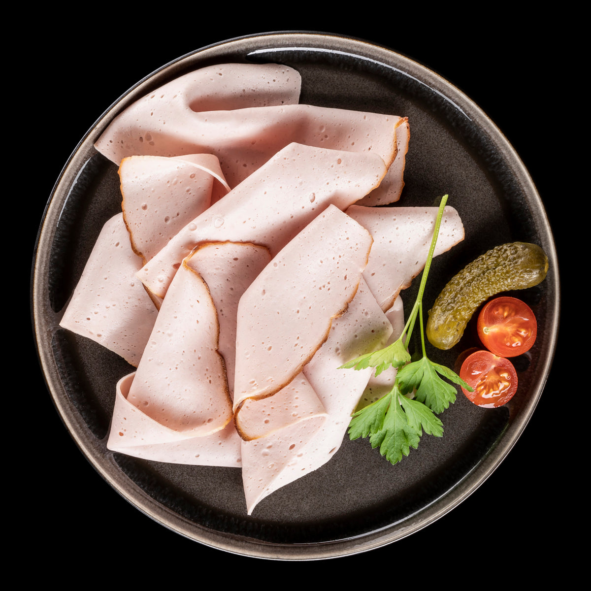 Fleischkäse geschnitten
